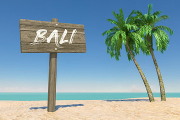 Poster - tourism and travel concept. wooden direction signbard with bali sign in tropical paradise beach with