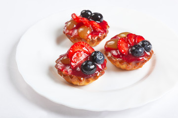 Wall Mural - Tartlet with berries and fruits