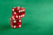 © LRafael - Stacked red dice in gambling table. Left positioned so you can use text on the side