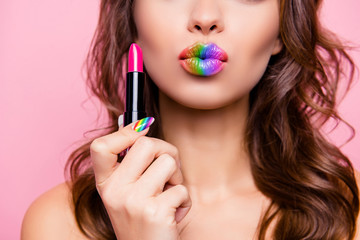 Cropped close-up shot portrait of nice gorgeous glamorous charming lady with amazing colorful tube pink pomade lips rainbow isolated over pink pastel background