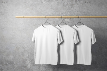 empty three white tshirts