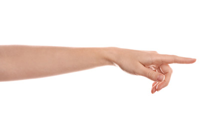 Wall Mural - woman pointing at something on white background, closeup of hand