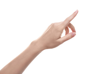 Wall Mural - woman pointing at something on white background, closeup of hand