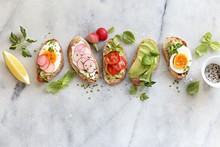 Breakfast Sandwich Bread With Avocado, Egg, Radishes And Tomatoes. Bruschetta Or Healthy Snack Ideas