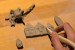 © Fertas - making objects with clay and tools. close up cropped photo about ceramics.