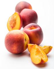 fresh peaches on white