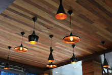 Modern Light Lamp Hanging Interior Decorative On Wooden Celling In Cafe