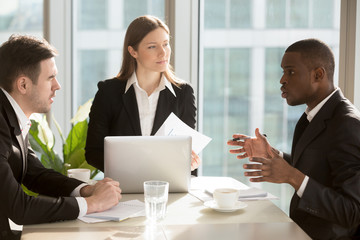 Wall Mural - Multiracial business people working together planning project and business strategy