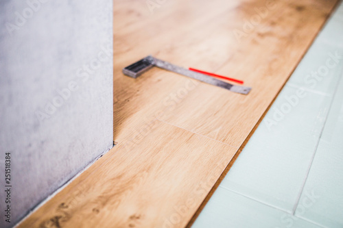 Floor Covering New Laminate Flooring In The Apartment With Tools Floor Covering New Laminate Flooring
