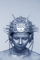 Sticker - Futuristic woman in metal helmet with screws, nuts and chains