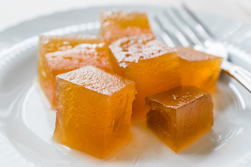 Wall Mural - Turkish Crispy Pumpkin Dessert from Hatay / Kirecte Kabak Tatlisi with Walnut Powder.