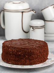 Wall Mural - Homemade delicious chocolate cake. Tasty treat in tea or coffee. Dessert for gourmets.  Selective focus