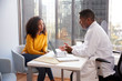 © Monkey Business - Serious Woman Having Consultation With Male Doctor In Hospital Office