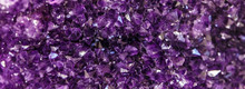 Amethyst Purple Crystal. Mineral Crystals In The Natural Environment. Texture Of Precious And Semiprecious Gemstone.