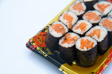 Wall Mural - Sushi Roll with salmon on the white background .Food abstract background