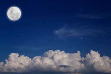 Wall Mural - blue night with full moon over cloud background. romantic concept.