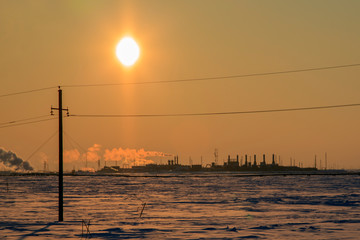 The power industry, Support of high-voltage transmission lines, Yellow background from sunset