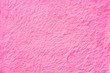 Pink fur texture close up. Pink fluffy fur background
