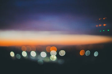 Wall Mural - wonderful atmospheric calm dawn above city. amazing picturesque romantic sunset. city lights in boke