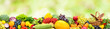 Collage and ripe fruits and vegetables on blurred green background.