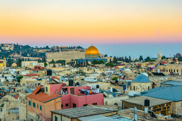 Wall Mural - Sunset view of Jerusalem dominated by golden cupola of the dome of the rock, Israel