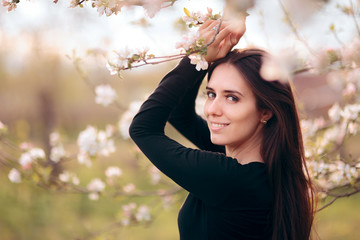 Portrait of a Beautiful Woman Outdoors in Spring Season