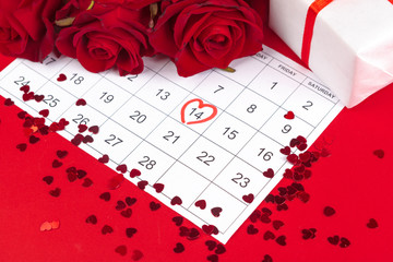 Wall Mural - February 14 on calendar and decorations for Valentine's Day.