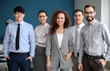 © Pixel-Shot - Team of young business people in office