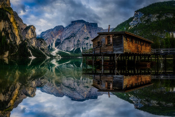 Wall Mural - Majestic landscape of Lago Braies, Pragser See, Dolomites mountain peak in sunrise light scenery in Eastern Dolomites, Italy Europe. Stunning mountain nature scenery and famous travel destination.