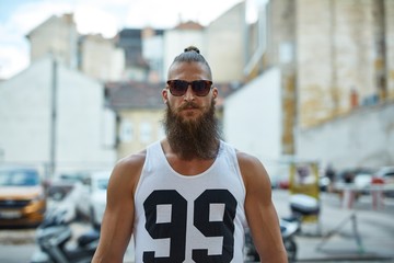 Wall Mural - Street portrait of young bearded man