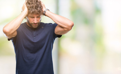 Sticker - Handsome hispanic model man over isolated background suffering from headache desperate and stressed because pain and migraine. Hands on head.