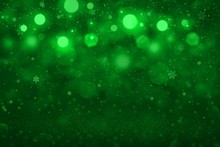 Green Fantastic Shining Glitter Lights Defocused Bokeh Abstract Background With Falling Snow Flakes Fly, Holiday Mockup Texture With Blank Space For Your Content
