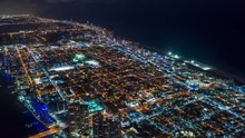 MIAMI, FLORIDA, USA - JANUARY 2019: Aerial Drone Panorama View Flight Over Miami Beach At Night. Aero Dronelapse In 4K.