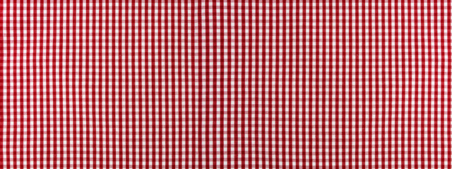 Wall Mural - Red and white checkered classic tablecloth fabric closeup, clean background.