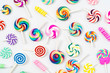 colorful lollipop and different colored round candy