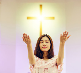 Wall Mural - Beautiful woman  praying to god.