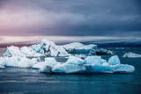 Fototapeta Morze - Large pieces of the iceberg in Jokulsarlon lagoon. Vatnajokull national park, Iceland.