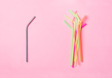 Zero Waste And Eco-friendly Green Lifestyle Concept Concept, Choice Between Reusable Metal Straw And Plastic Straws