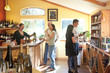 © ML Harris - People customers wine tasting shopping in winery tasting room