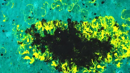 Poster - Close-up of yellow ink stain and black falling ink drops on a turquoise gel background. Art and textures.