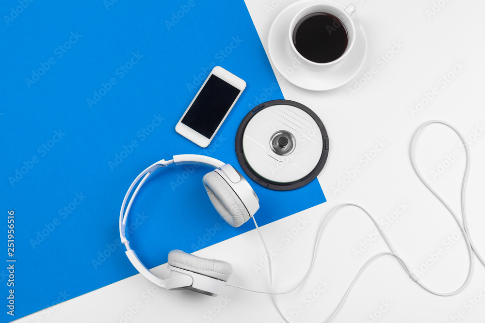 Stylish headphones on blue and white color background, top view. - obrazy, fototapety, plakaty 