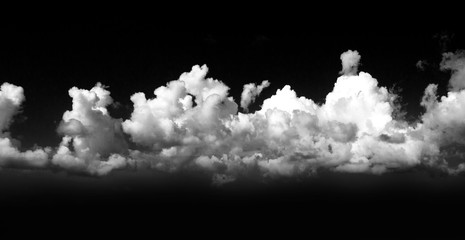 clouds on black sky