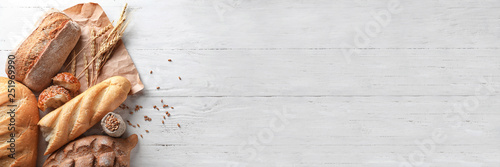 Cuadros en Lienzo Different bakery products on wooden background