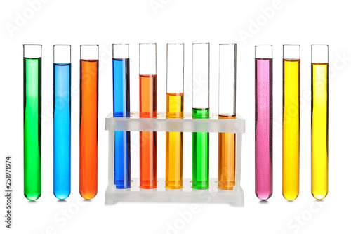 Laboratory test tubes with color samples on white background
