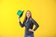 © Pixel-Shot - Beautiful young woman with green hat on color background. St. Patrick's Day celebration