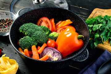 Sticker - fresh vegetables in a skillet prepared for stewing