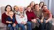 © JackF - Family with children are posing for photos.
