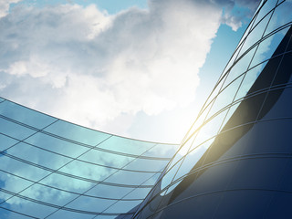 Poster - 3D stimulate of high rise curve glass building and dark steel window system on blue sky background,Business concept of future architecture,lookup to the angle of the building.