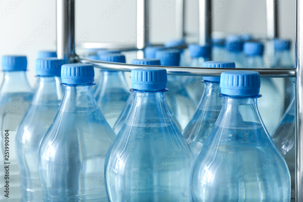 Many bottles of clean water in shop