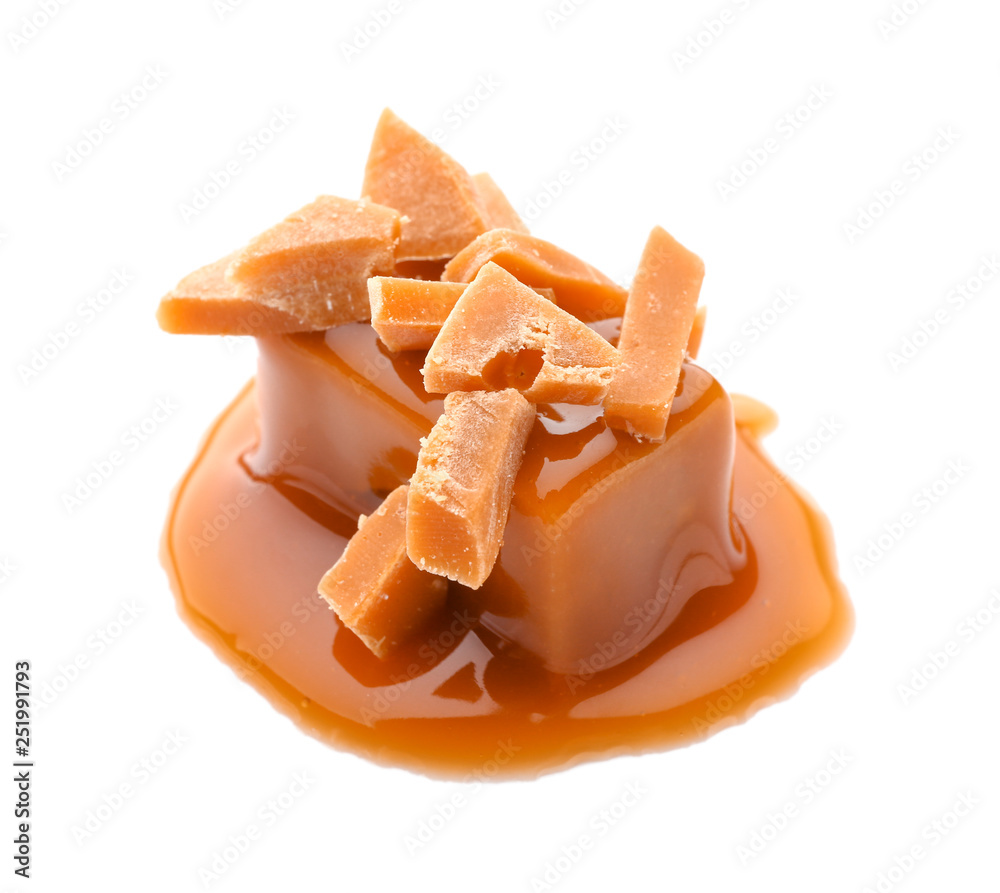 Tasty caramel candies on white background